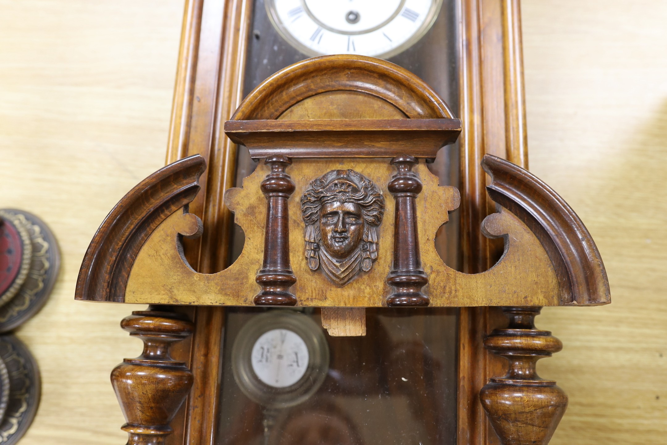 A 19th century German walnut wall timepiece, 89 cms high